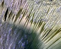 Flowing Water on Mars Appears Likely But Hard to Prove