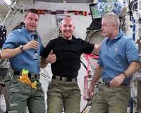 Duo Tries on Spacesuits While Advanced Microgravity Science Continues