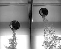 Why buoyant spheres don't always leap out of the water