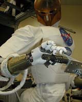 Human-Like Space Robot Goes Mobile With Leg, Wheels