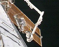 Discovery crew embarks on third spacewalk
