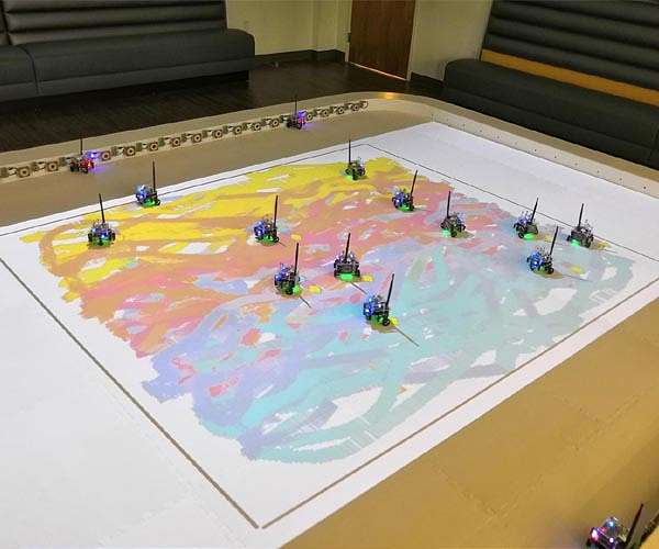 Swarming microrobots self-organize into diverse patterns