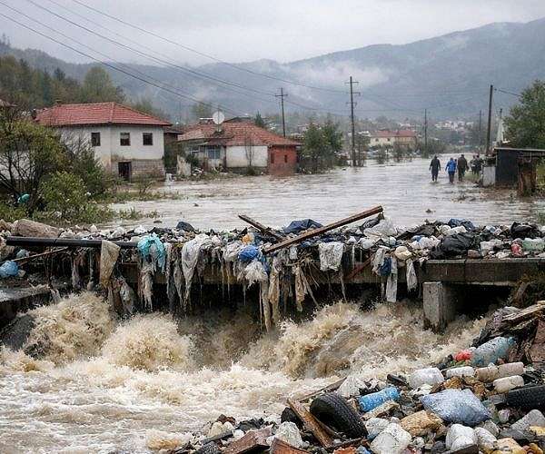 Albania's waste-choked rivers worsen deadly floods