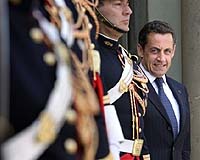 Sarkozy wins confidence vote on return to NATO command