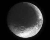 Cassini Exposes Saturn's Two-Face Moon
