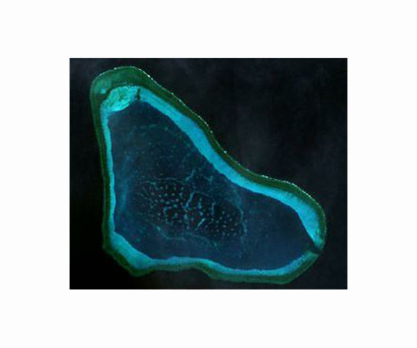 Chinese military sends 'patrols' around contested South China Sea shoal
