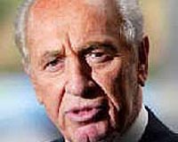 Peres praises Kerry after attacks by Israeli hawks