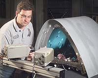 Damage Detectives Inspect Shuttle On Orbit