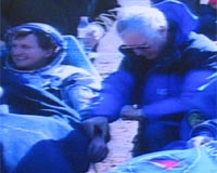 Two-time space tourist returns to Earth