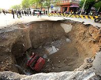 Down in the dumps: China lawmaker given 5 years for sinkhole
