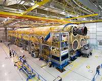 NASA attaches first of 4 RS-25 engines to Artemis I rocket stage