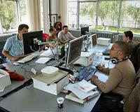 Office sharing startup WeWork plans to cut valuation to below $20 bn