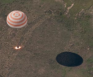 Canadian ISS astronaut returns to Earth a star