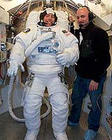 NASA Cuts Shuttle Mission Spacewalks By One