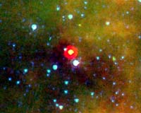 Spitzer Sees Ice And Warm Glows In Dark And Dusty Places
