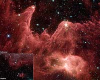 Spitzer Captures Cosmic Mountains Of Creation