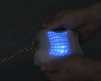 Researchers unveil light-up, stretchable robot skin