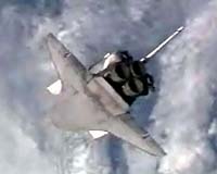 Shuttle Endeavour heads home after shorter, successful mission