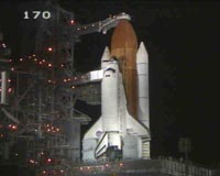 Astronauts board Discovery for fourth launch attempt
