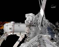 Discovery Astronauts Begin Spacewalk To Extend ISS