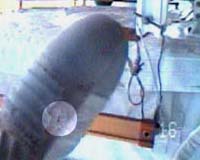 Punctured astronaut's spacesuit cuts short spacewalk
