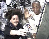 Crew Holds Class In Space, Prepares For Possible Repair Work