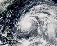 Philippine miners dig for their own in typhoon landslide