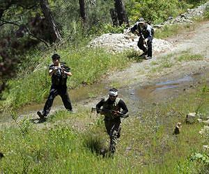 Qaeda-linked fighters tighten grip on Syria border town