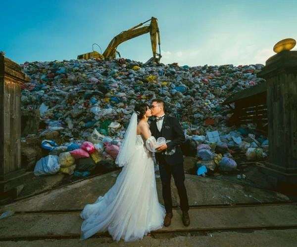 'Til trash do us part: Taiwan couple embraces garbage wedding shoot