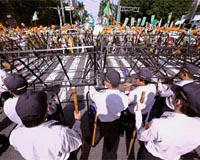 Protests greet top China negotiator on Taiwan visit