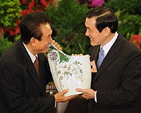 Taiwan president in historic meeting with Chinese envoy