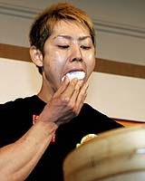 Japanese Eating Champion Wins Hong Kong Contest, Downs 100 Buns In 12 Mins