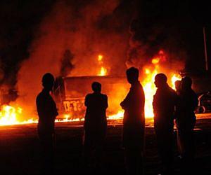 Gunmen torch NATO withdrawal trucks in Pakistan