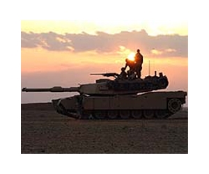 Ambush threatens to enmesh Iraq in Syria civil war
