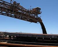 Australia lowers iron ore price forecast as China outlook softens
