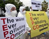 Fukushima nuclear workers rally against plant operator
