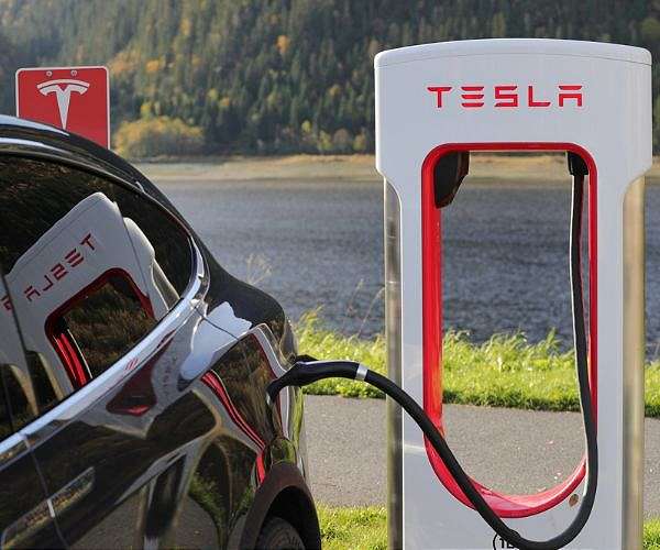 Tesla reports lower 2024 auto deliveries as BYD EV sales soar
