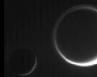 Saturn Moons In Ghostly Specter
