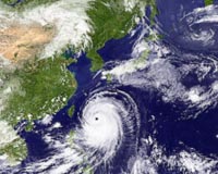 Strong typhoon churns towards Japan