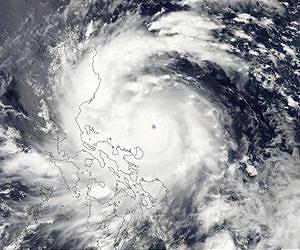Philippine rescuers race to help typhoon-hit towns
