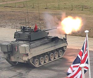 British defence chief fights for job amid friend row