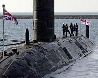 British MPs back new PM and vote to update nuclear deterrent