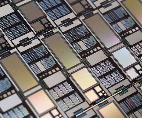 Taiwan raids firms accused of stealing chip industry secrets