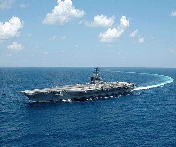 Eisenhower carrier strike group sailors line up for vaccines